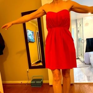 Deep pink / Red strapless dress gently worn with built in corset & inside clasp.